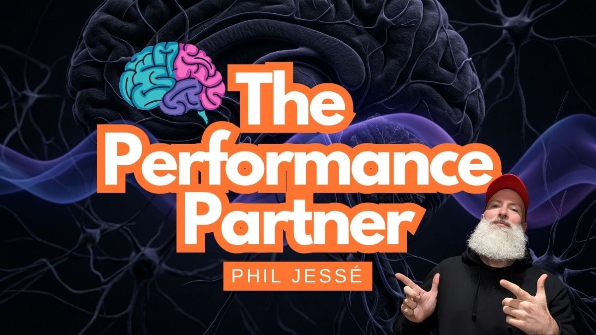 hil Jesse, the Performance Partner for Organisations, pointing at his branding for corporate executive performance.