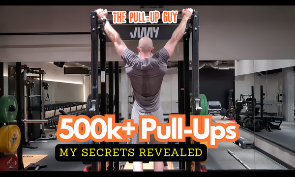 Phil Jessé performing a pull-up with the text overlay '500K+ Pull-Ups, My Secrets Revealed